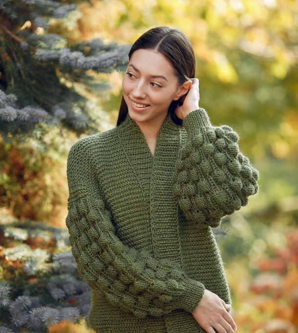 The Story of Nepalese Artisans: Handwoven Pashmina from the Himalayas 2 women in a cashmere sweater